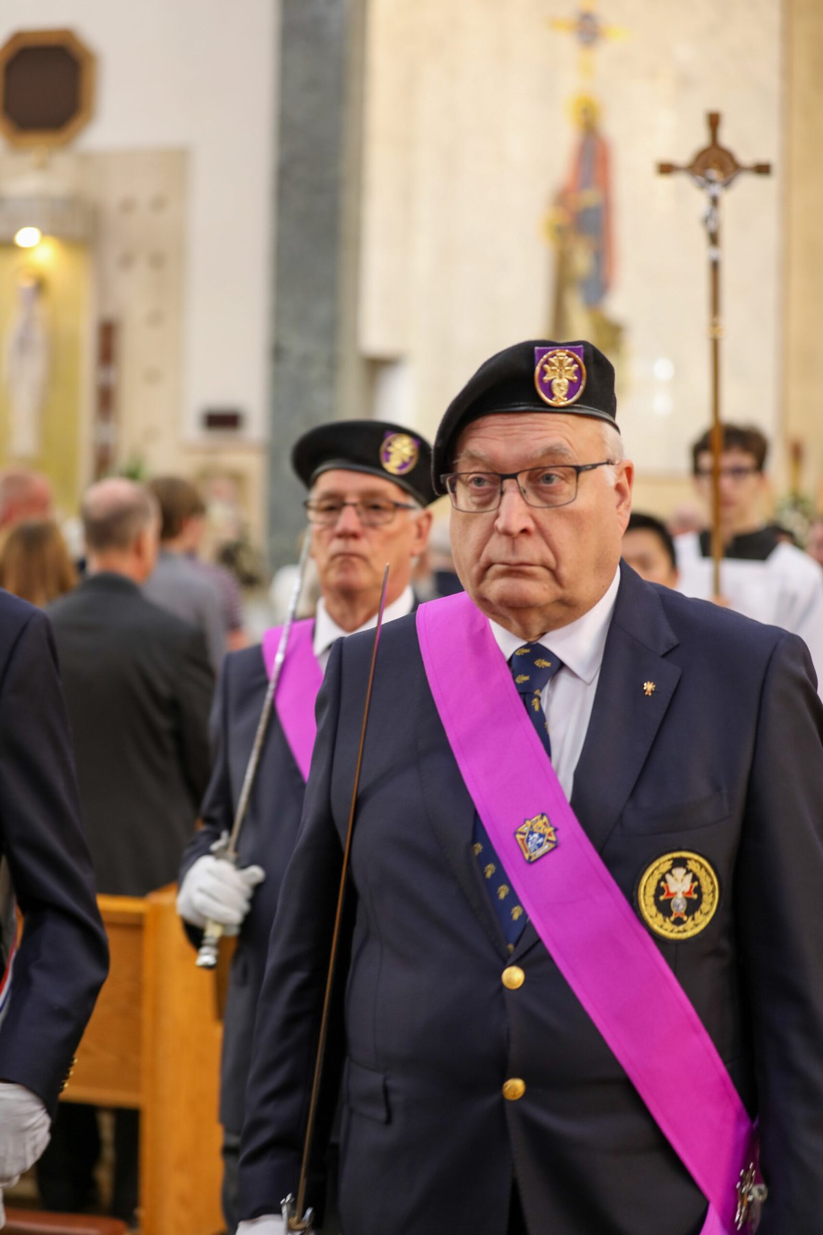 An honor guard leads the procession